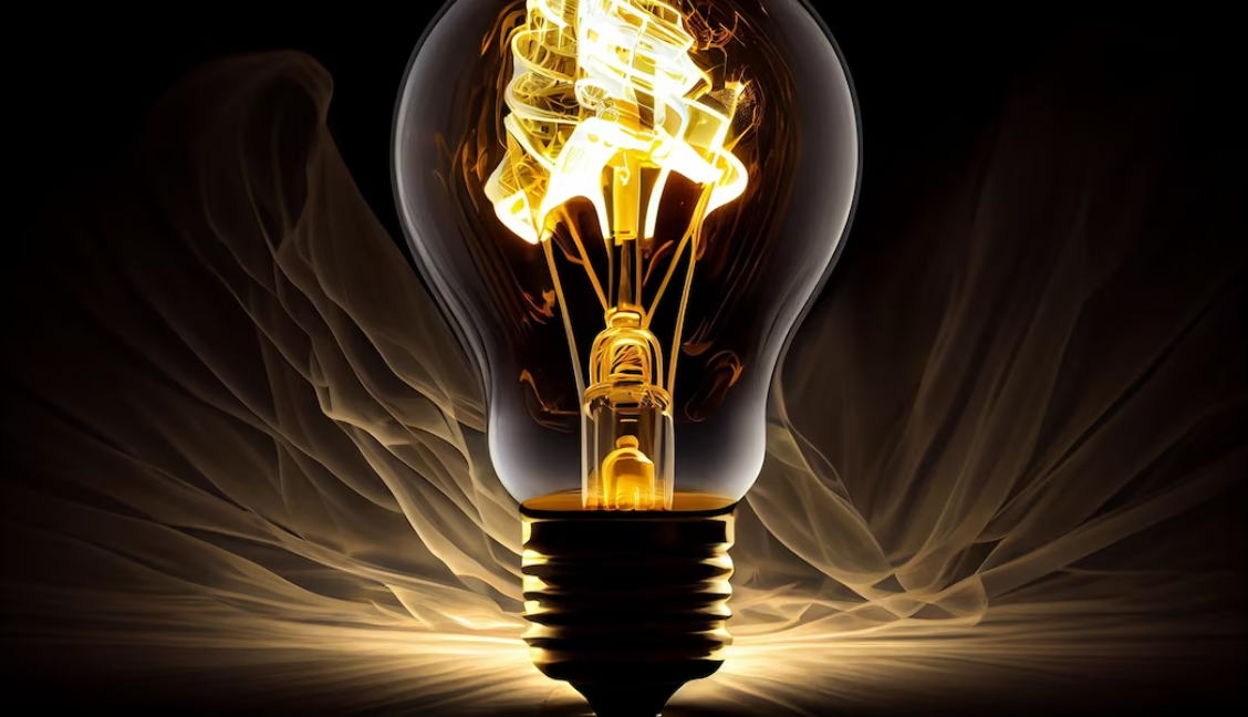 glowing yellow light bulb